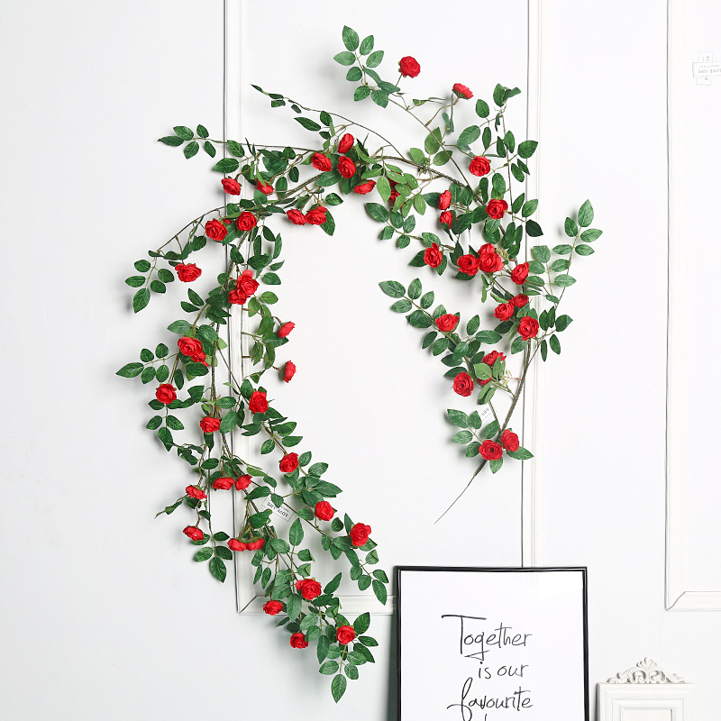 Artificial silk roses with realistic feel, perfect for wedding decorations, home decor, and floral arrangements in vases or pots.